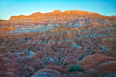 A colorful butte reflects last light in Northern AZ