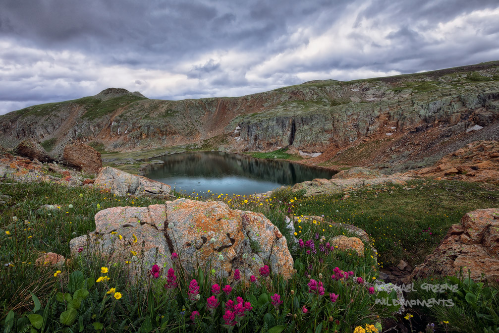 A wicked summer evening storm rolls in above Porphyry Basin at 12,500 feet near the Red Mountain. It was already raining during...