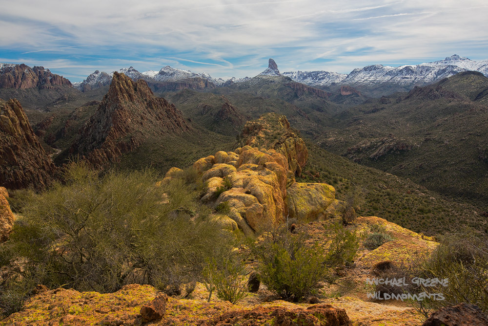 A dramatic view of snow-capped Weaver's Needle as seen from Battleship Mountain the day after a massive winter snowstorm in the...