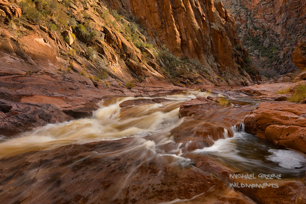 A temporary river rages through a slot canyon in the backcountry of the Superstition Mountains after a series of winter storms...