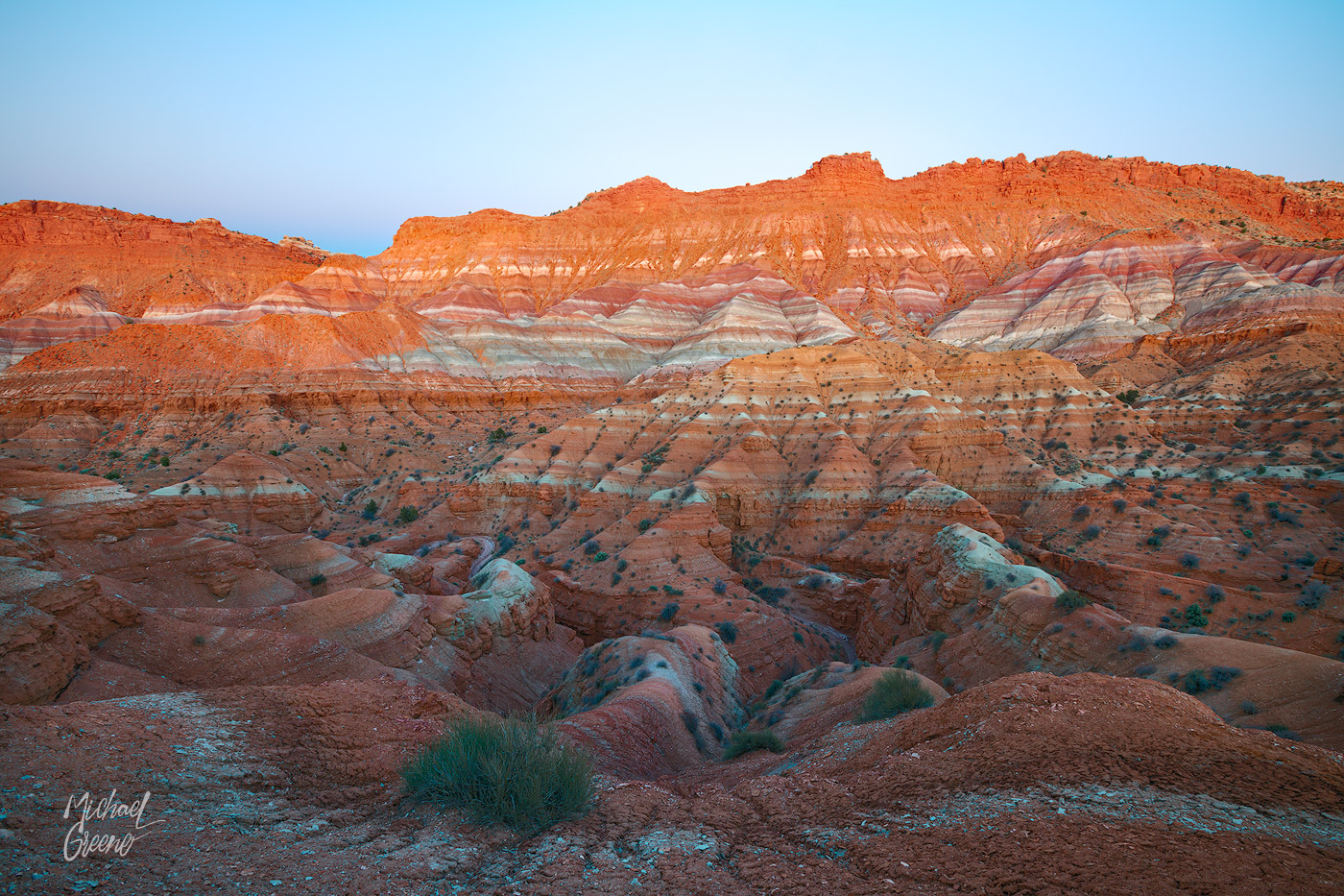 A colorful canyon of red clay and rock formations near the AZ and UT state border.