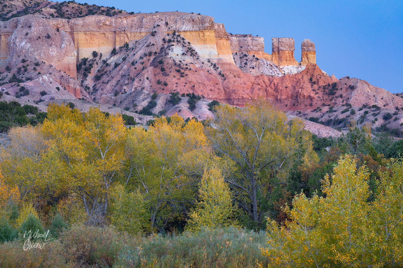 Blue hour accentuates the colorful rock formations of Northern New Mexico.