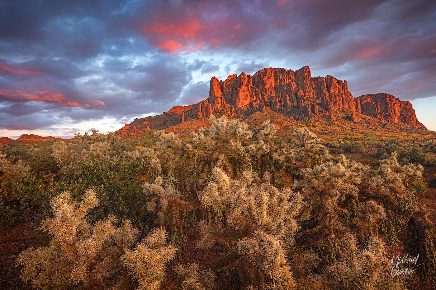 A day of spectacular conditions comes to a close with sunset spots of pink dotting the sky. The Superstition Mountains are located...