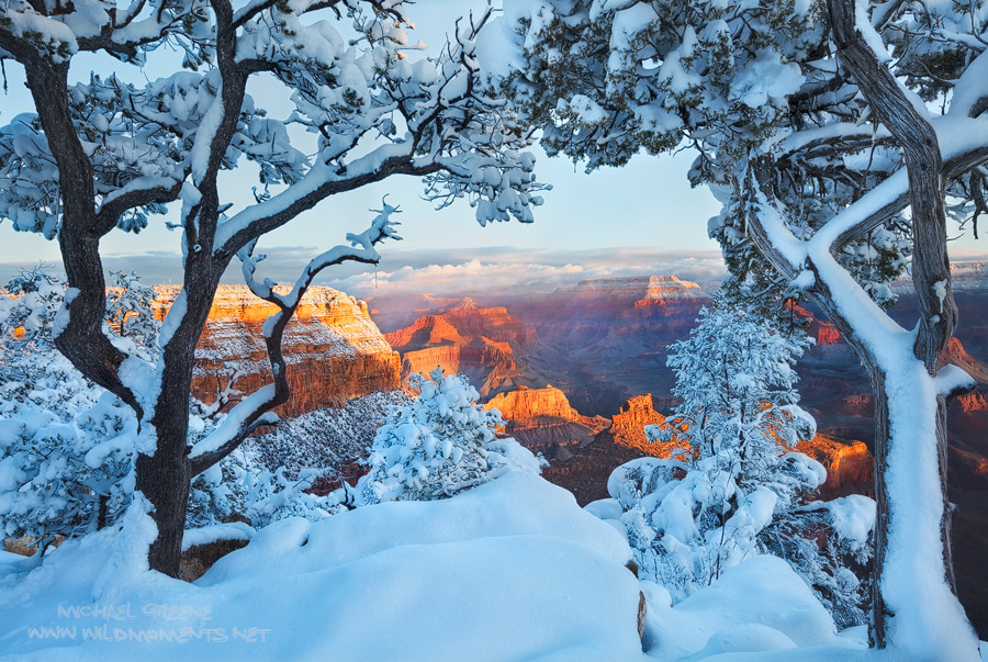 Sunshine and lingering clouds accentuated the splendid scenery during sunrise at Grand Canyon NP after a winter snowstorm.