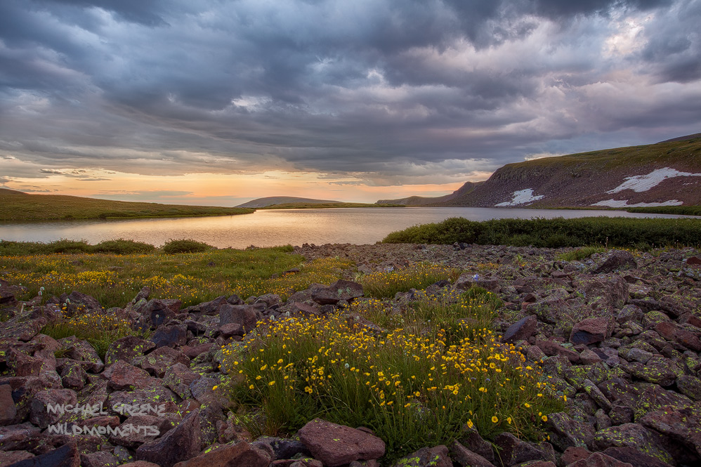 The last rays of sunlight from a distant horizon grace the waters of Tobacco Lake as an overnight summer storm settles in. This...