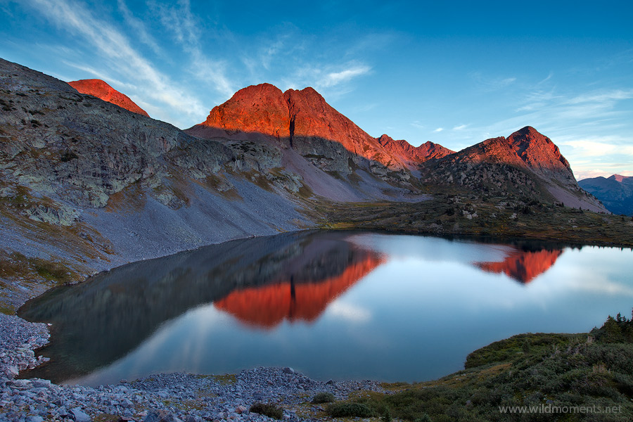 Alpenglow captured from a vista above the massive cirque that forms Rock Lake (11,841 ft) deep within the boundaries of the San...