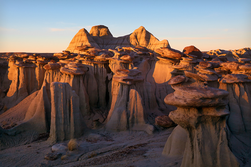 The last rays of light grace this incredibly unique and bizarre sandstone formation located in a remote section of badlands in...