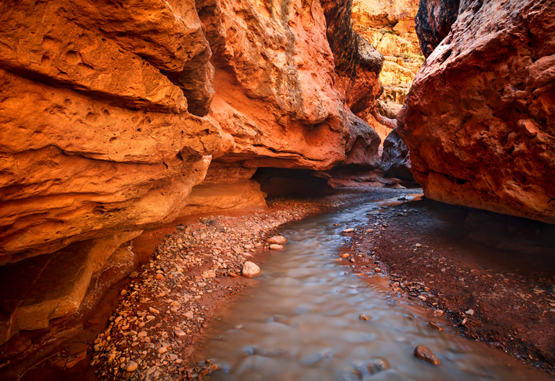 An incredible palette of sandstone colors deep in a remote slot canyon in Central Utah. A 20 second exposure was needed to capture...