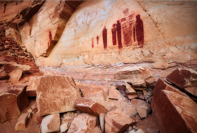 Ancient celestial figures decorate a hidden rock alcove deep in Horseshoe Canyon. These pictographs are estimated to be over...