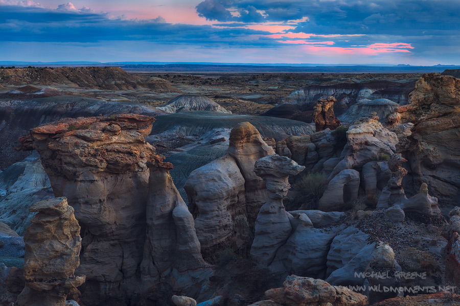 Blue hour in the De Zan Nin Wilderness captured from a perch in a hoodoo filled basin with deep views of the colorful sky.