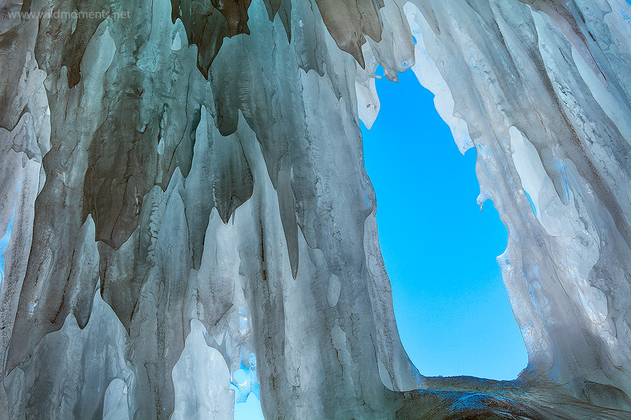 A difficult perspective of a wonderful abstract view through an ice like arch on a gorgeous blue bird day near Lake City, CO.