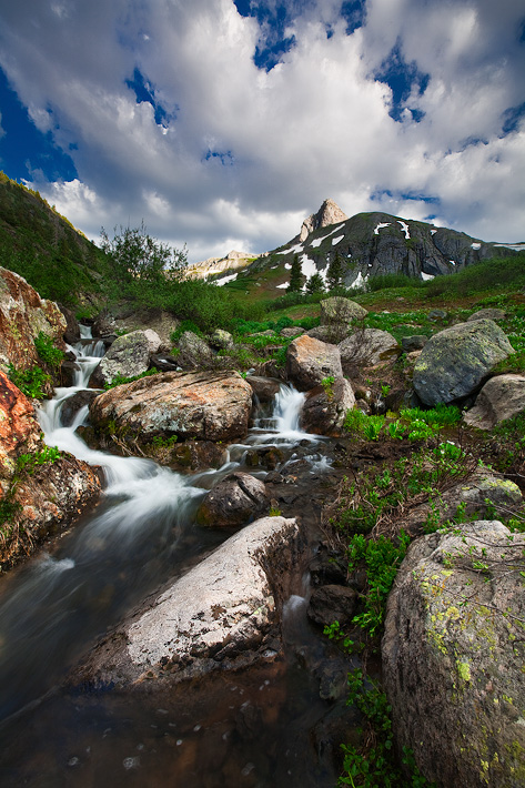 The approaching danger of the summer monsoon season is foreshadowed with fierce skies illuminating a 12,000 foot peak in Colorado...