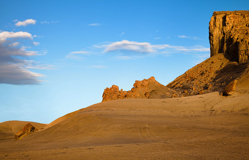 Cryptobiotic Rock near Lake Powell, Utah. This stark, barren landscape comes alive in the early morning with soft light, pastel...