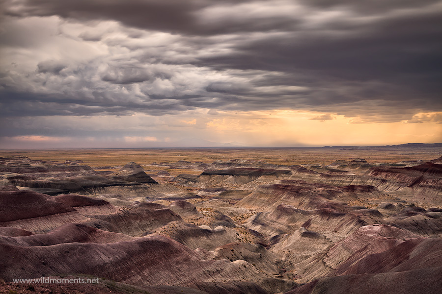 A long exposure adds to the intrigue of a distant storm captured from a remote perch in the painted desert near Winslow, AZ.