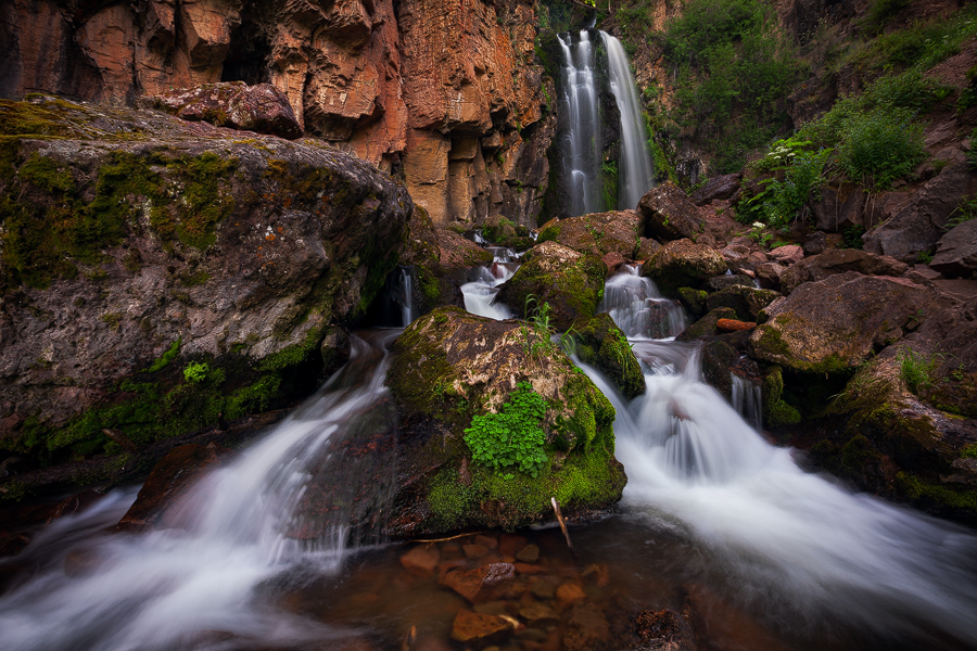 Remote Rough Creek Falls is located in the heart of the South San Juan Wilderness. The falls are found in a sandstone ravine...