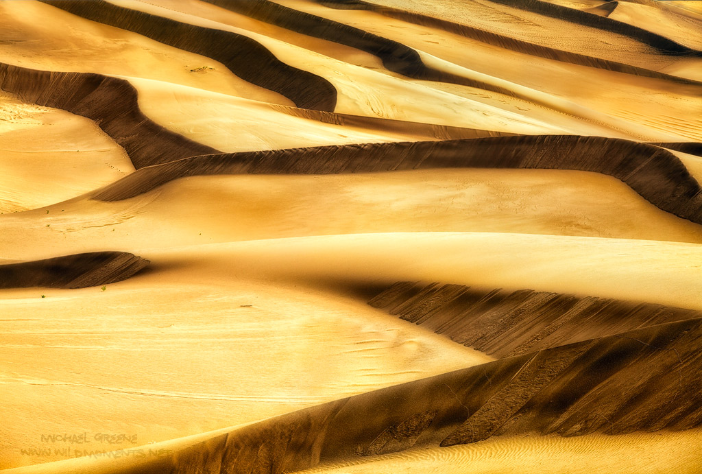I used a telephoto lens to compress the sand patterns of the front dunes in Great Sand Dunes NP while exploring during summer...